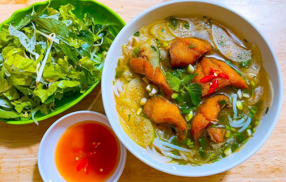 Hanoi’s classic bun ca, combining tender fish, dill, and a savory broth